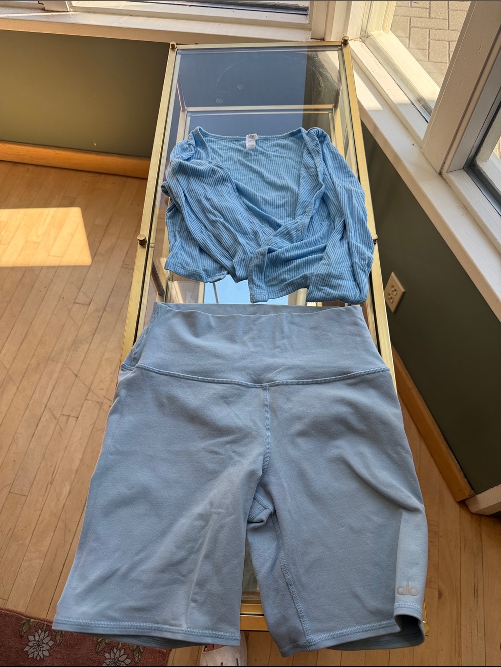 ALO Yoga Light Blue High-Rise Bike Shorts with cop cardigan